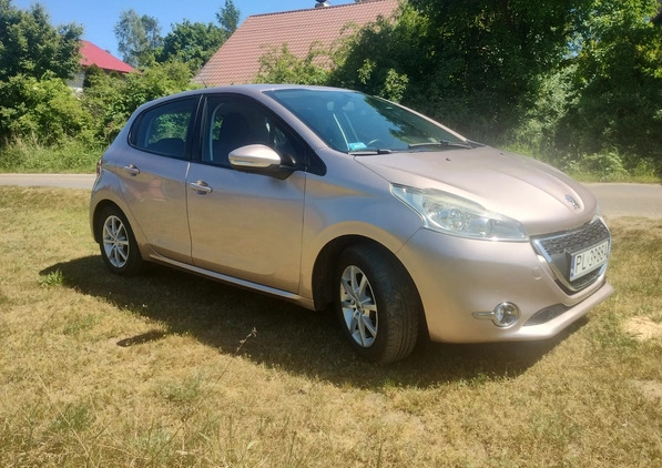 Peugeot 208 cena 22900 przebieg: 196500, rok produkcji 2012 z Leszno małe 67